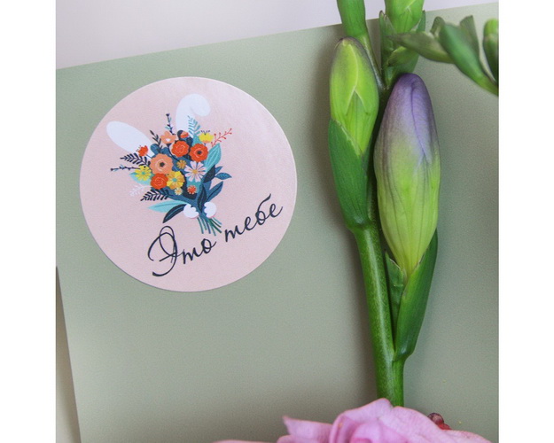 Букет з 9 ірисів у дизайнерській упаковці